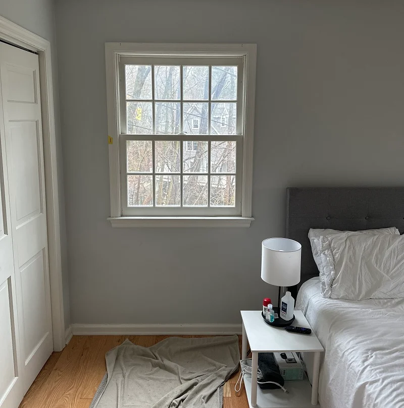 Wood bedroom window with 8 over 8 grid pattern in Wilton,CT